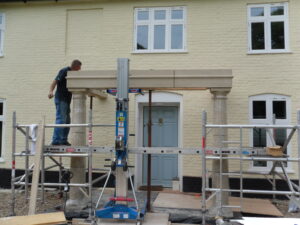 cast stone portico installation