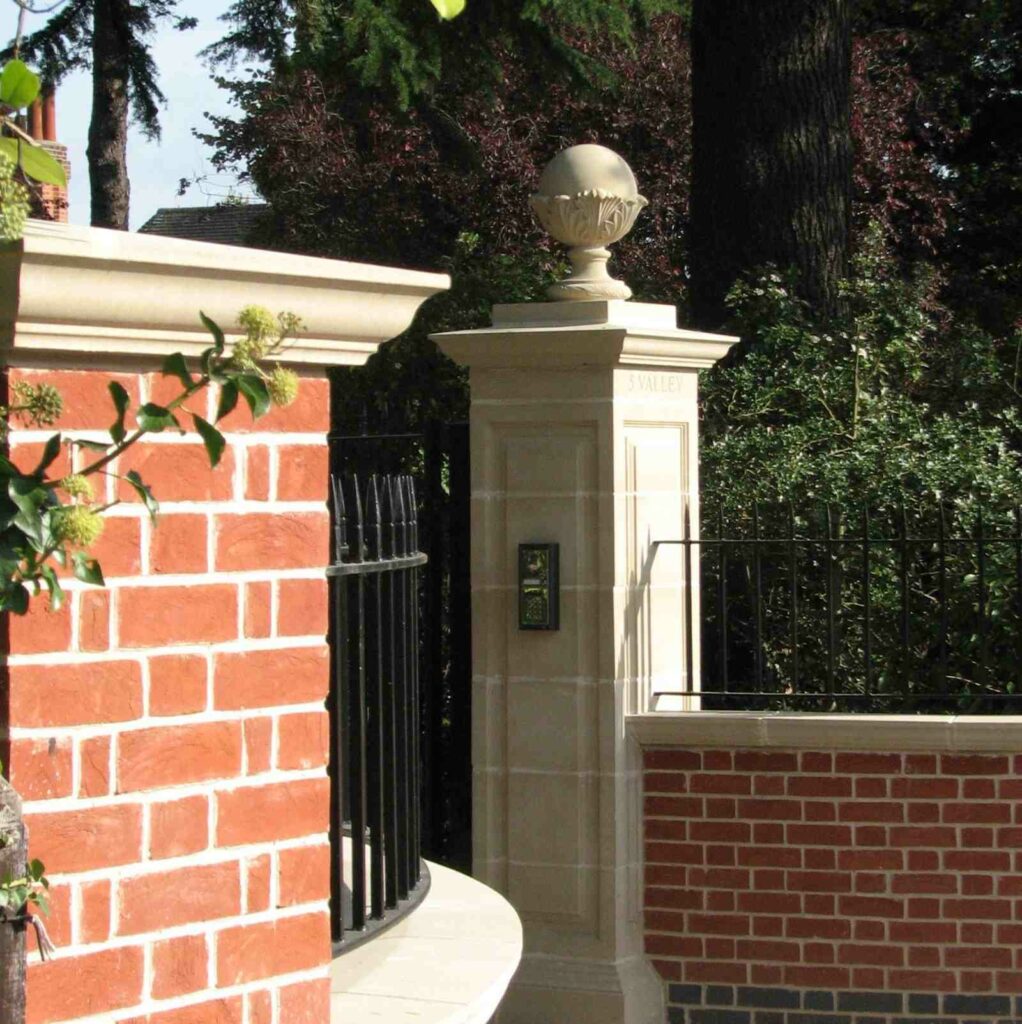 Acanthus Cast Stone coping stones and pier caps add character and interest to an entrance