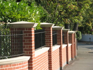 cast stone pier caps with overhangs and drop grooves